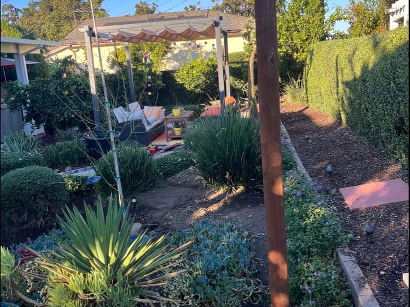 Drought-tolerant garden with agave, pots and gravel in Anaheim